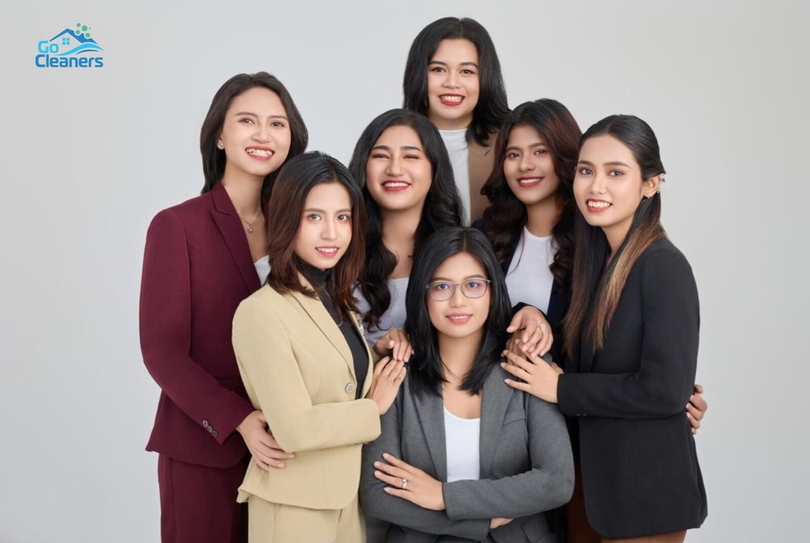 Go Cleaners customer support team, professional studio portrait